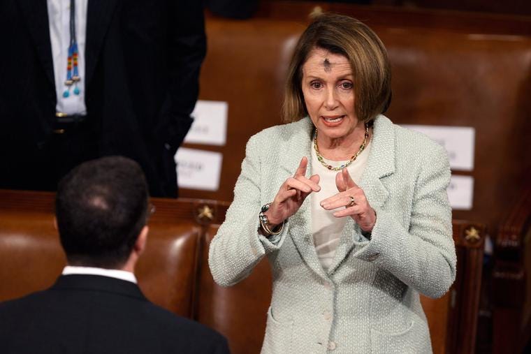 House Minority Leader Nancy Pelosi, D-Calif., talks with fellow representatives before Australian Prime Minister Julia Gillard address a joint meeting of the U.S. Congress at the U.S. Capitol March 9, 2011 in Washington, DC. Pelosi is wearing ashes on her forehead because it is Ash Wednesday, the first day of the Lenten season in the Catholic Church. House Minority Leader Nancy Pelosi, D-Calif., talks with fellow representatives before Australian Prime Minister Julia Gillard address a joint meeting of the U.S. Congress at the U.S. Capitol March 9, 2011 in Washington, DC. Pelosi is wearing ashes on her forehead because it is Ash Wednesday, the first day of the Lenten season in the Catholic Church.