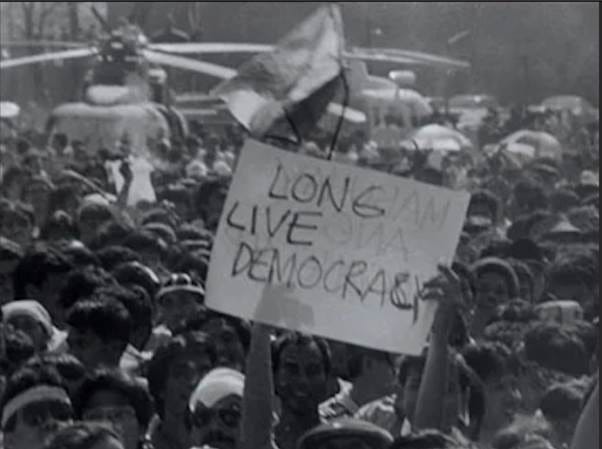 A crowd of people holding a sign
AI-generated content may be incorrect. A crowd of people holding a sign
AI-generated content may be incorrect.