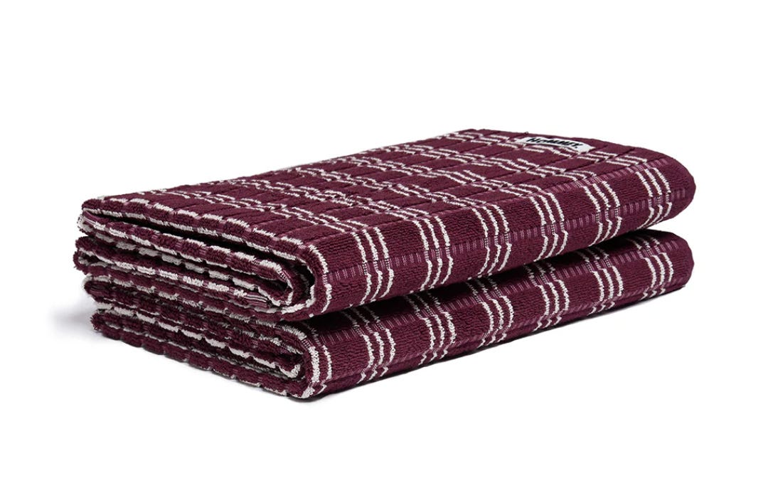 Two purple and white striped towels.