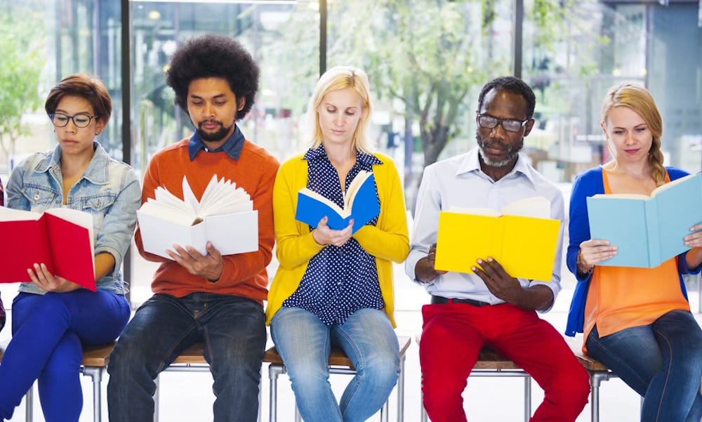 Group of people reading together Group of people reading together