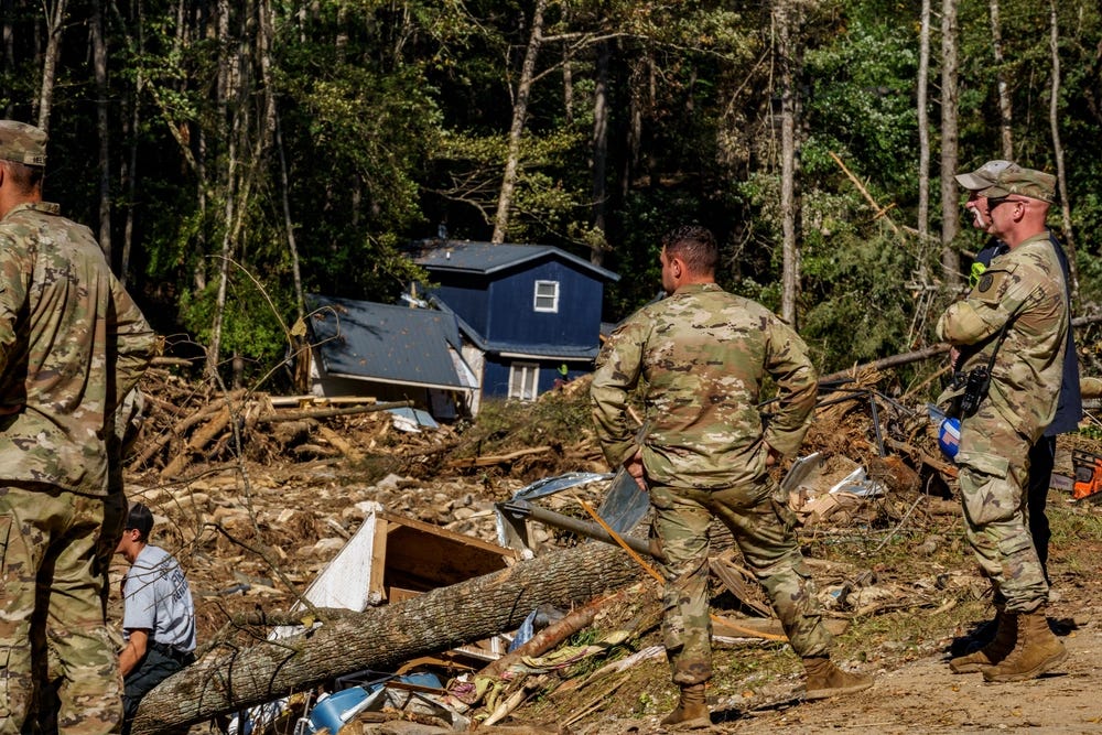 North Carolina National Guard soldiers assist the Indiana Task Force One Urban Search and Rescue team
