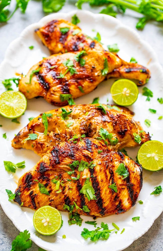 Grilled Lime Cilantro Chicken - EASY, ready in 10 minutes, and the chicken is so TENDER, juicy, and full of Mexican-inspired flavor!! Put this HEALTHY chicken recipe on your summer menu rotation and it'll be a hit with everyone!! Grilled Lime Cilantro Chicken - EASY, ready in 10 minutes, and the chicken is so TENDER, juicy, and full of Mexican-inspired flavor!! Put this HEALTHY chicken recipe on your summer menu rotation and it'll be a hit with everyone!!