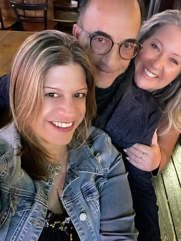 May be an image of 2 people and people smiling