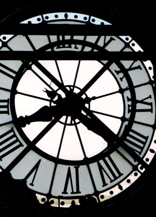 The Musée d'Orsay's large clock on a monotone background of black and white.