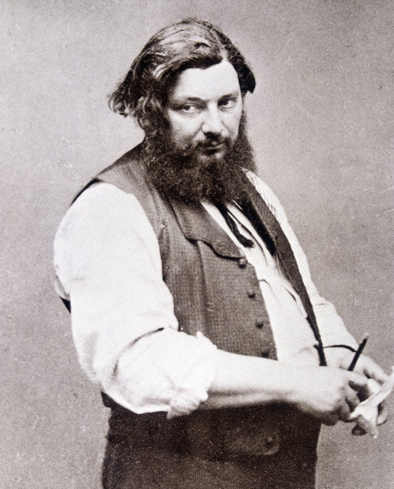 Bearded man in a dark coat