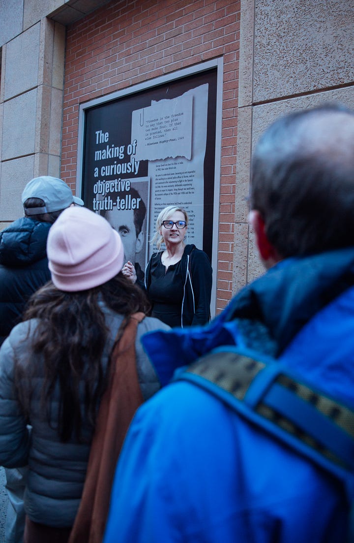 Richard Blair, Pamela Tinnen and members of the public inspect the exhibition, which includes reproductions from the UNESCO-registered Orwell Archive at UCL (Worth Studios)