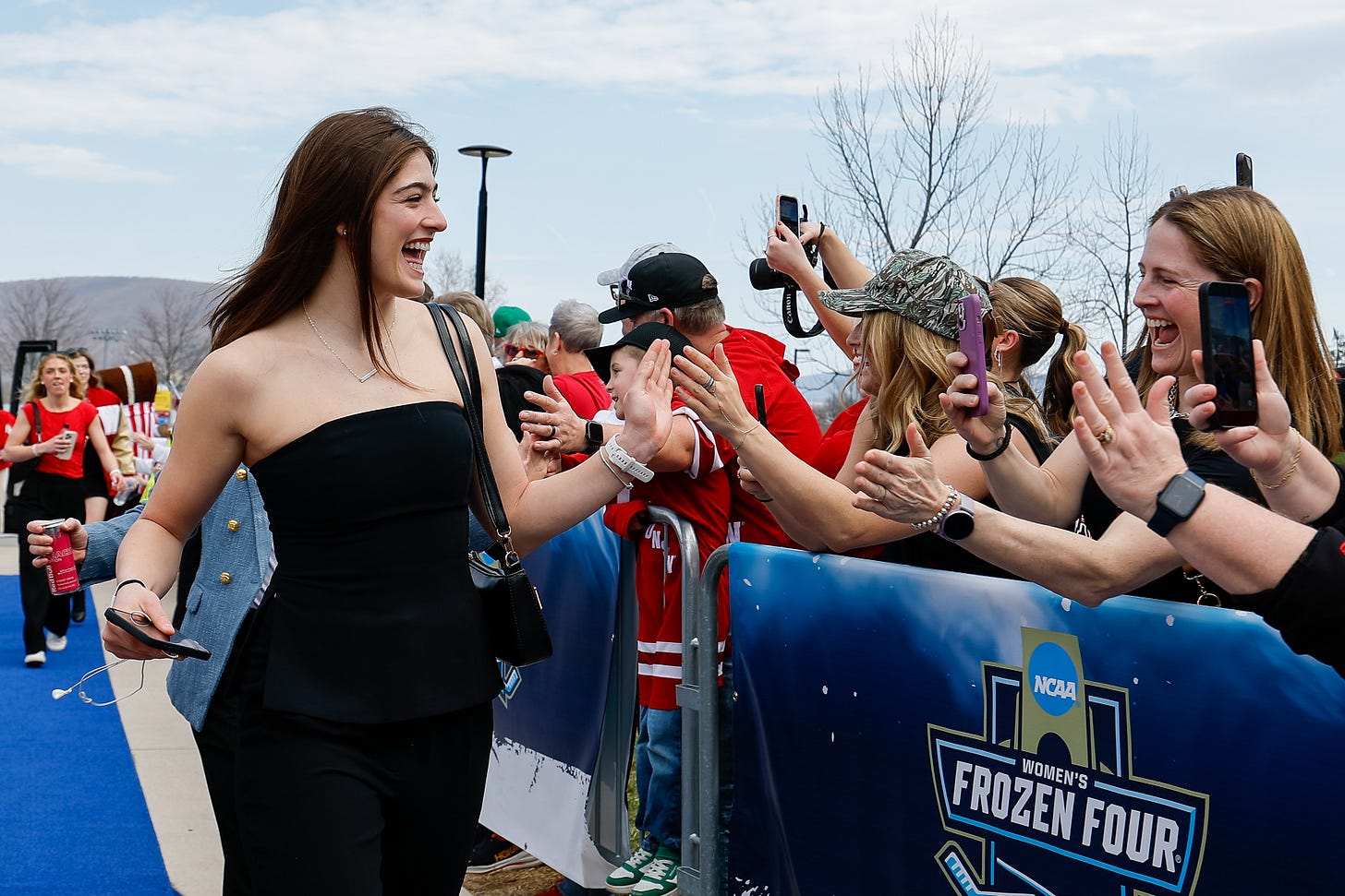 Ava Murphy high fiving