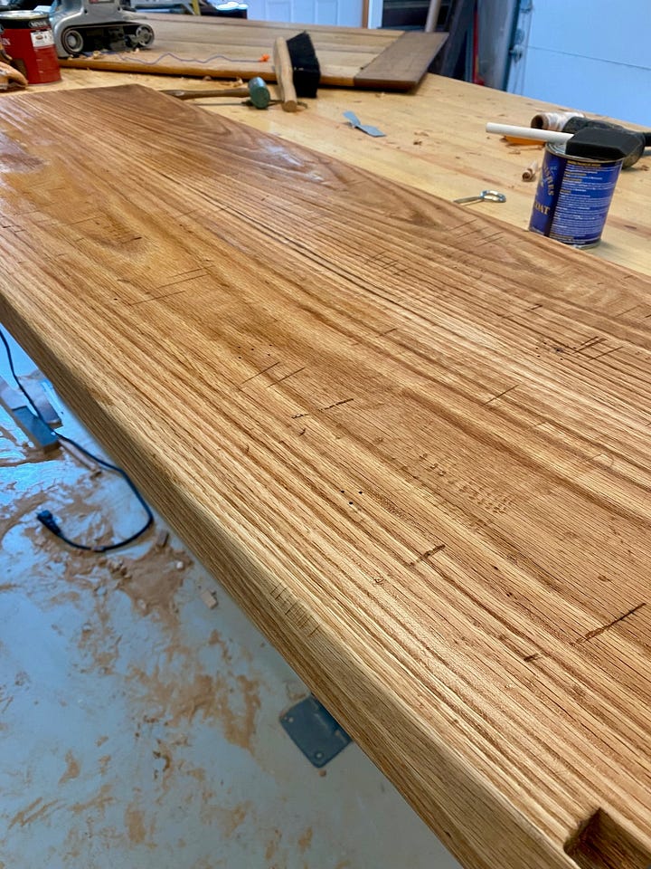Distressing and cutting red oak.