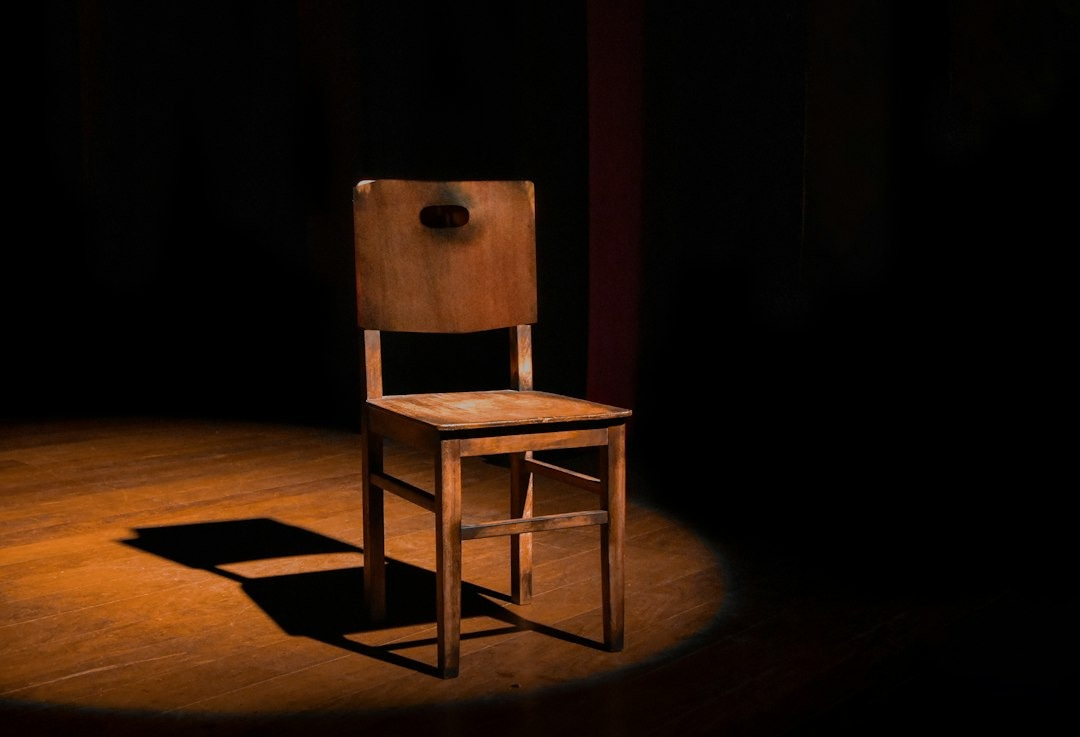 vacant brown wooden armless chair vacant brown wooden armless chair