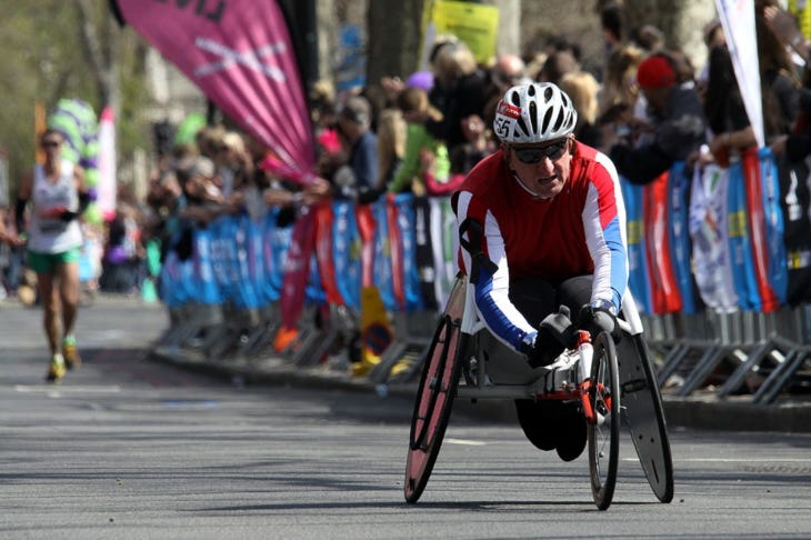 A wheelchair athlete competing in the London Marathon