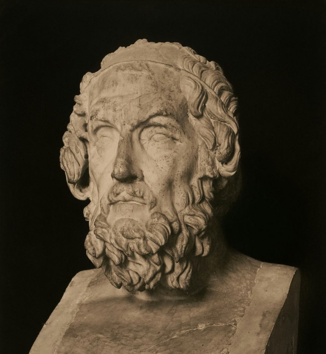 A stone bust of the greek poet homer.