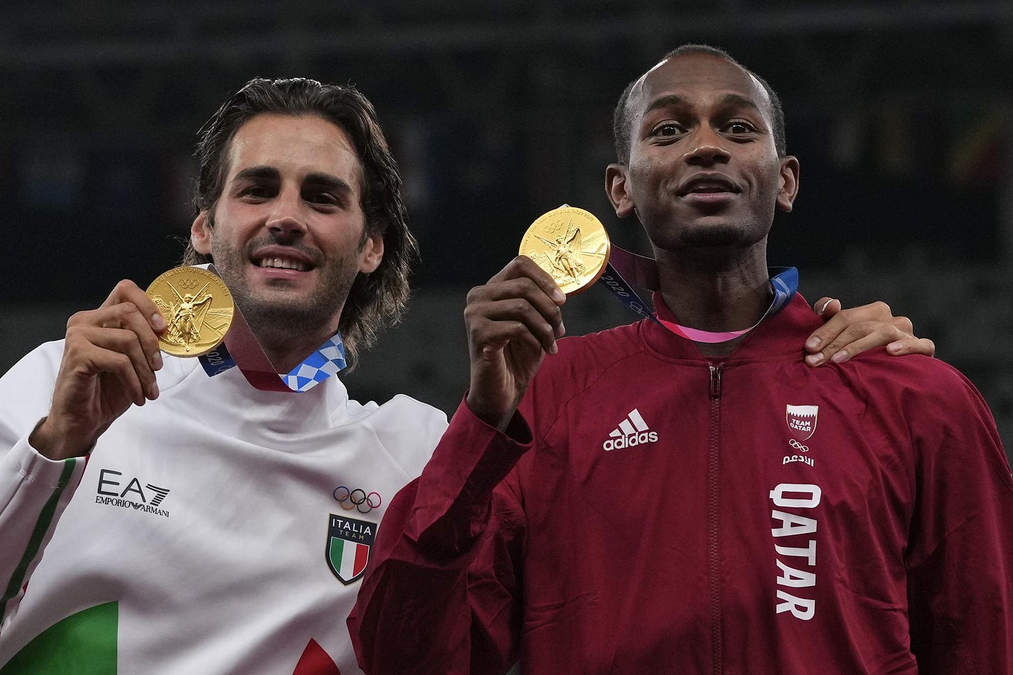 You made me cry': Olympian touched by impact of shared gold | AP News