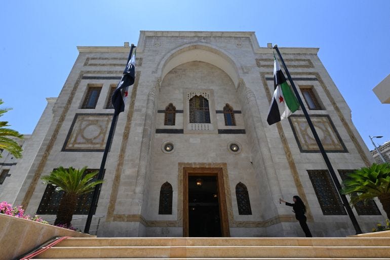 Syria delays first session of transitional parliament without explanation |  News | Al Jazeera