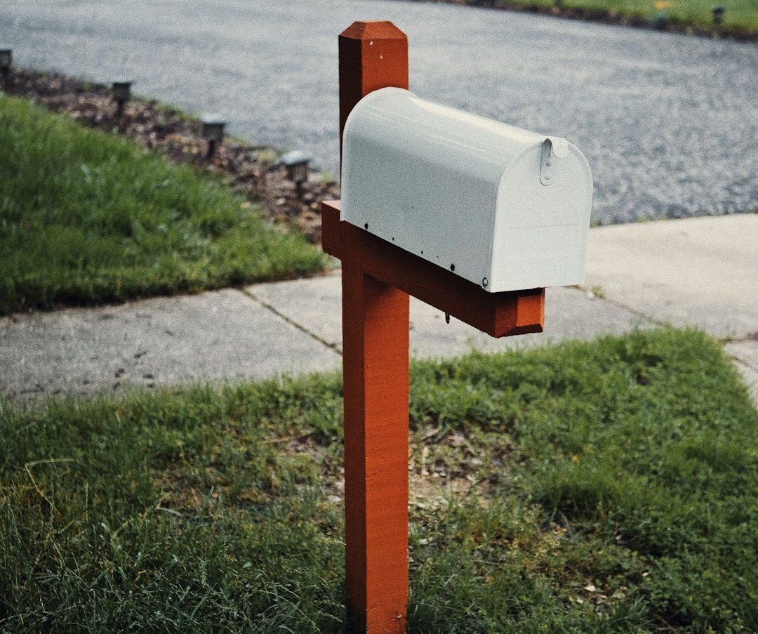 gray metal mail box gray metal mail box
