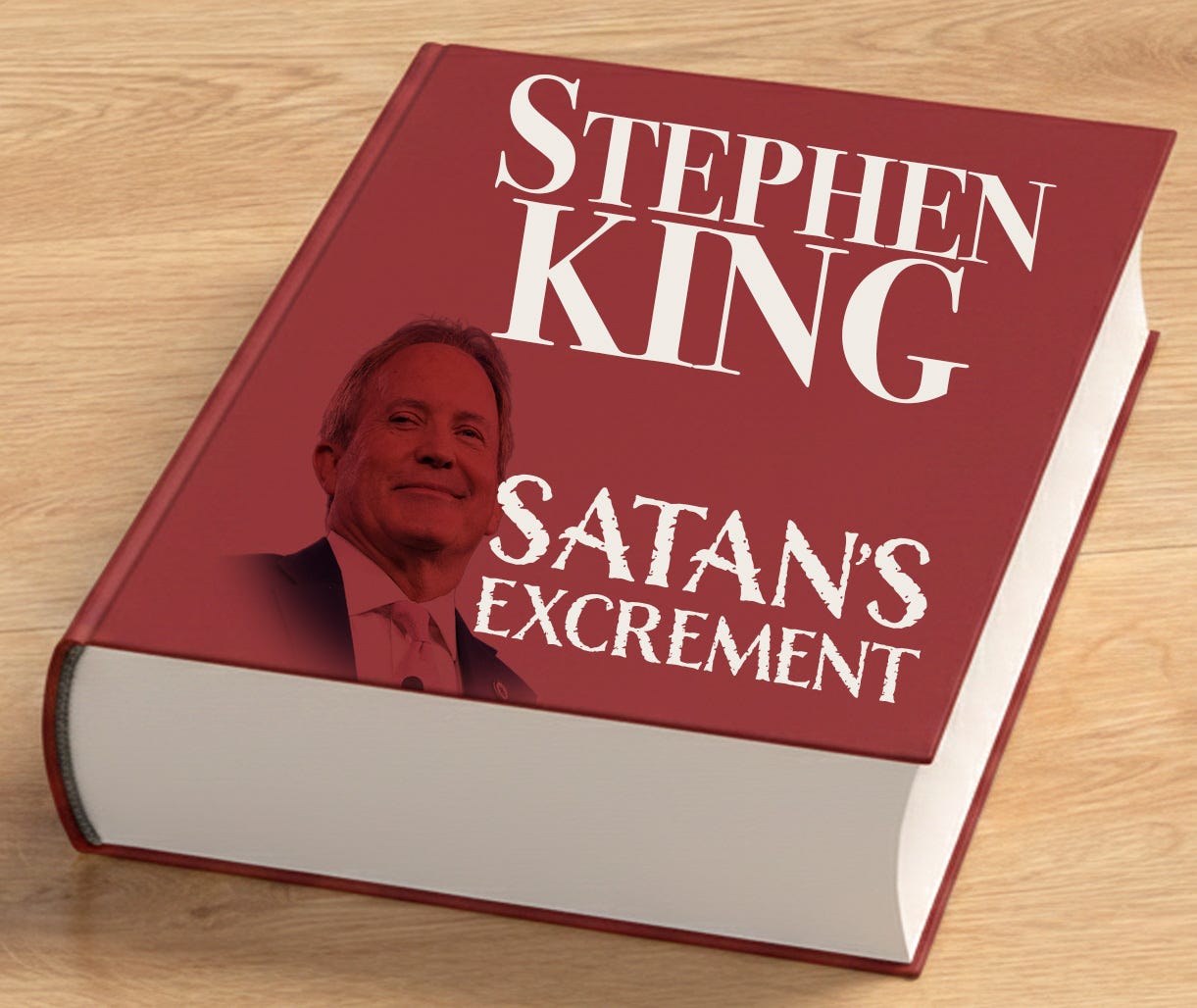 Faux Stephen King book titled 'Satan's Excrement' with Ken Paxton shown prominently Faux Stephen King book titled 'Satan's Excrement' with Ken Paxton shown prominently