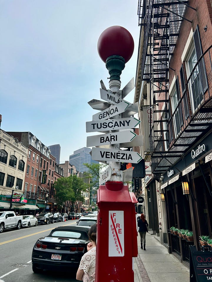 buildings, streets, signs, people