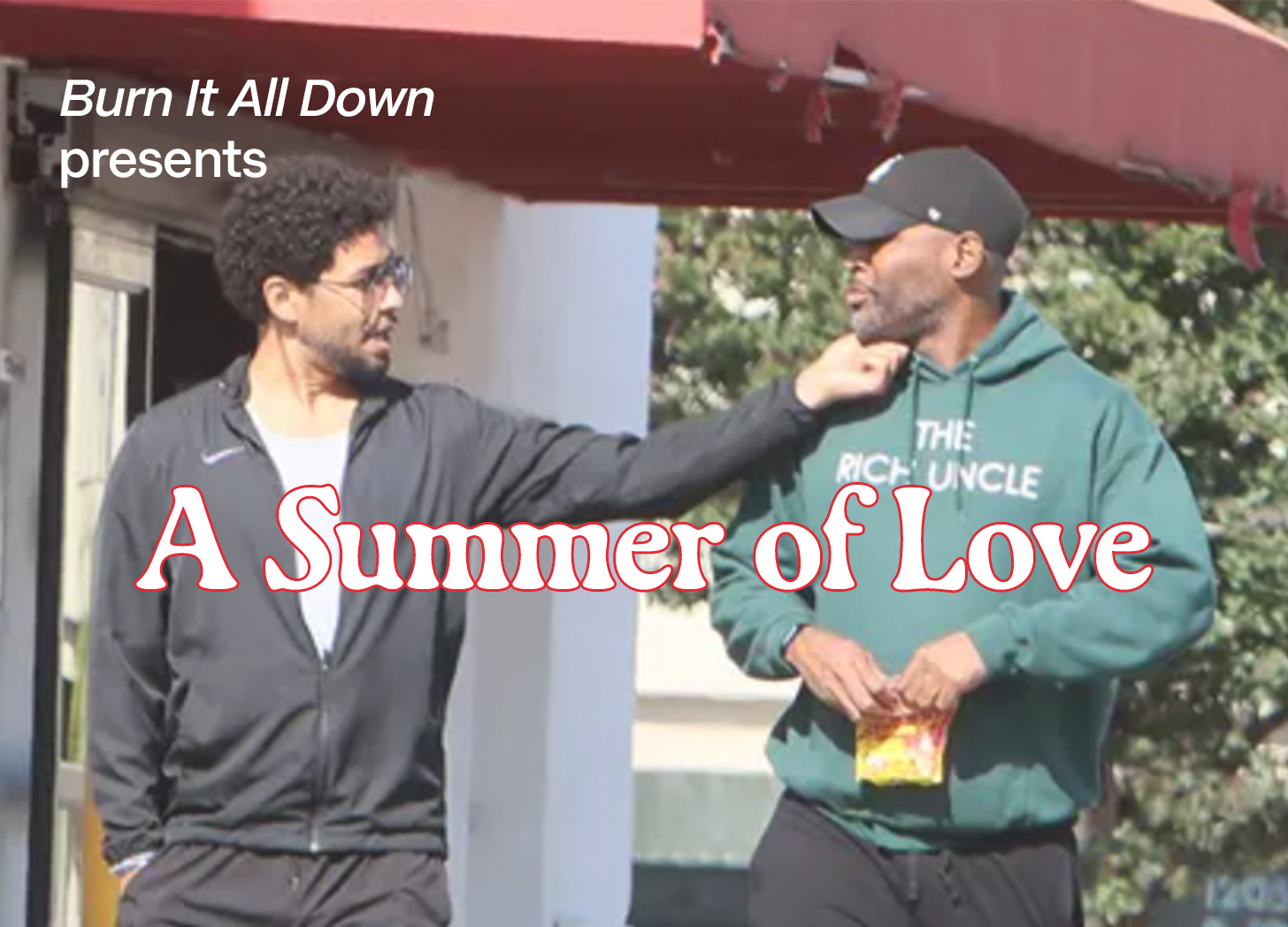 paparazzi photo of Jussie Smollett holding Karamo's chin with text that says, "Burn It All Down presents: A Summer of Love" paparazzi photo of Jussie Smollett holding Karamo's chin with text that says, "Burn It All Down presents: A Summer of Love"