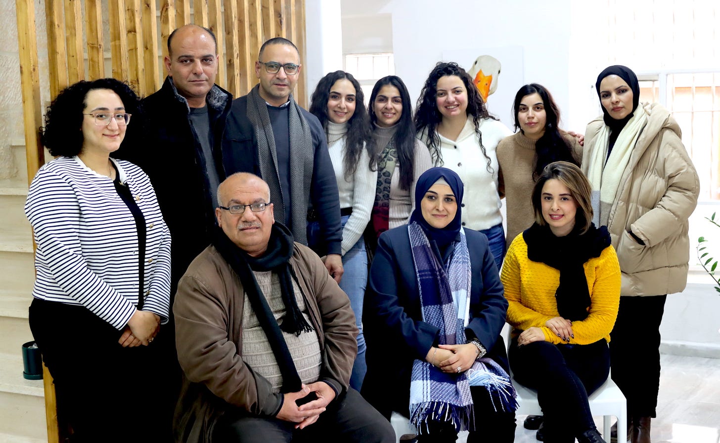 Group photo of Anar's eleven staff members