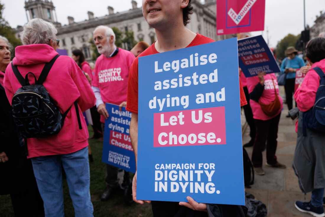 Campaigners in Parliament Square in favor of the proposed bill to legalize assisted dying, on Oct. 16 in London, England. Campaigners in Parliament Square in favor of the proposed bill to legalize assisted dying, on Oct. 16 in London, England.