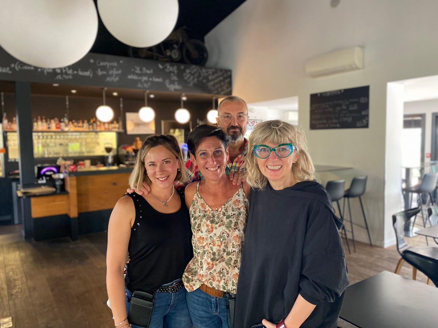 The owners and staff at ô sens 60 with Suzy