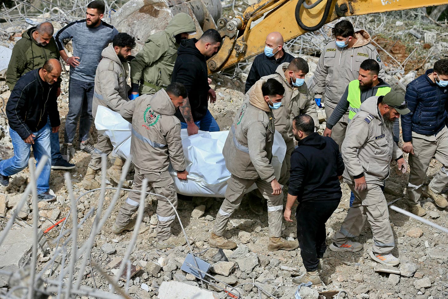 First responders take a remove a body of a person killed in an Israeli strike that targeted the southern Lebanese village of Kfar Hatta, on April 5, 2026. Photo by AFP via Getty Images