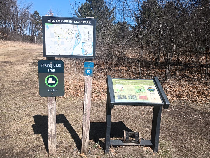 park map sign, start of trail sign, information about the things to see