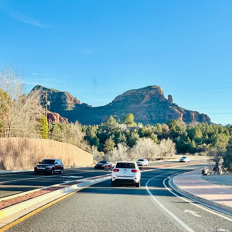 statues, mountains, people, roads
