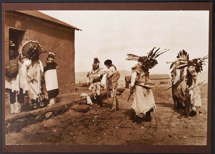 A group of people wearing traditional clothing

AI-generated content may be incorrect.