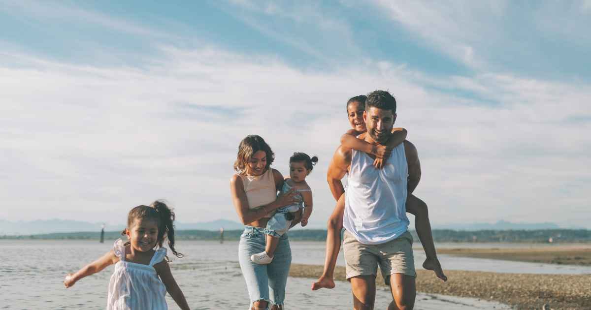 Family with kids at the beach