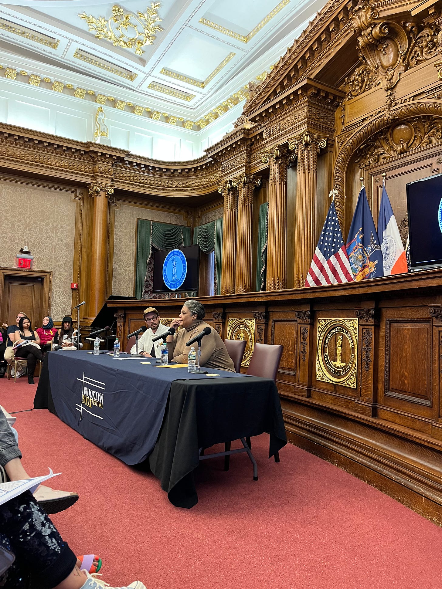 roxane gay and oliver jeffers talking to an audience