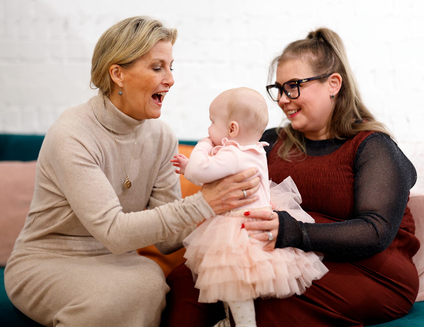 The Duchess of Edinburgh smiling at baby