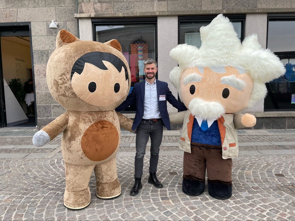 Man standing with large avatars