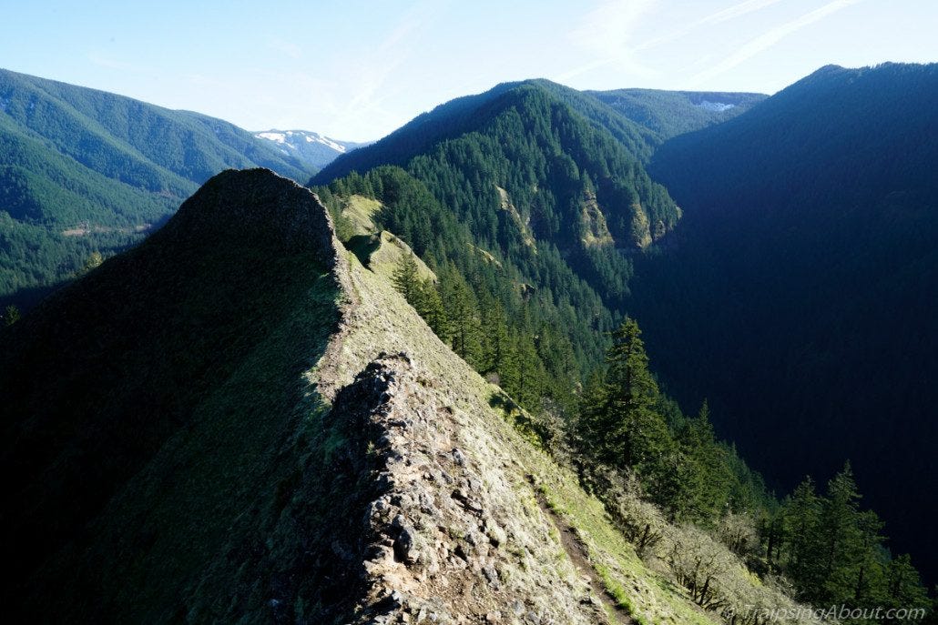 Straddling a narrow ridge near Munra Point in Oregon.