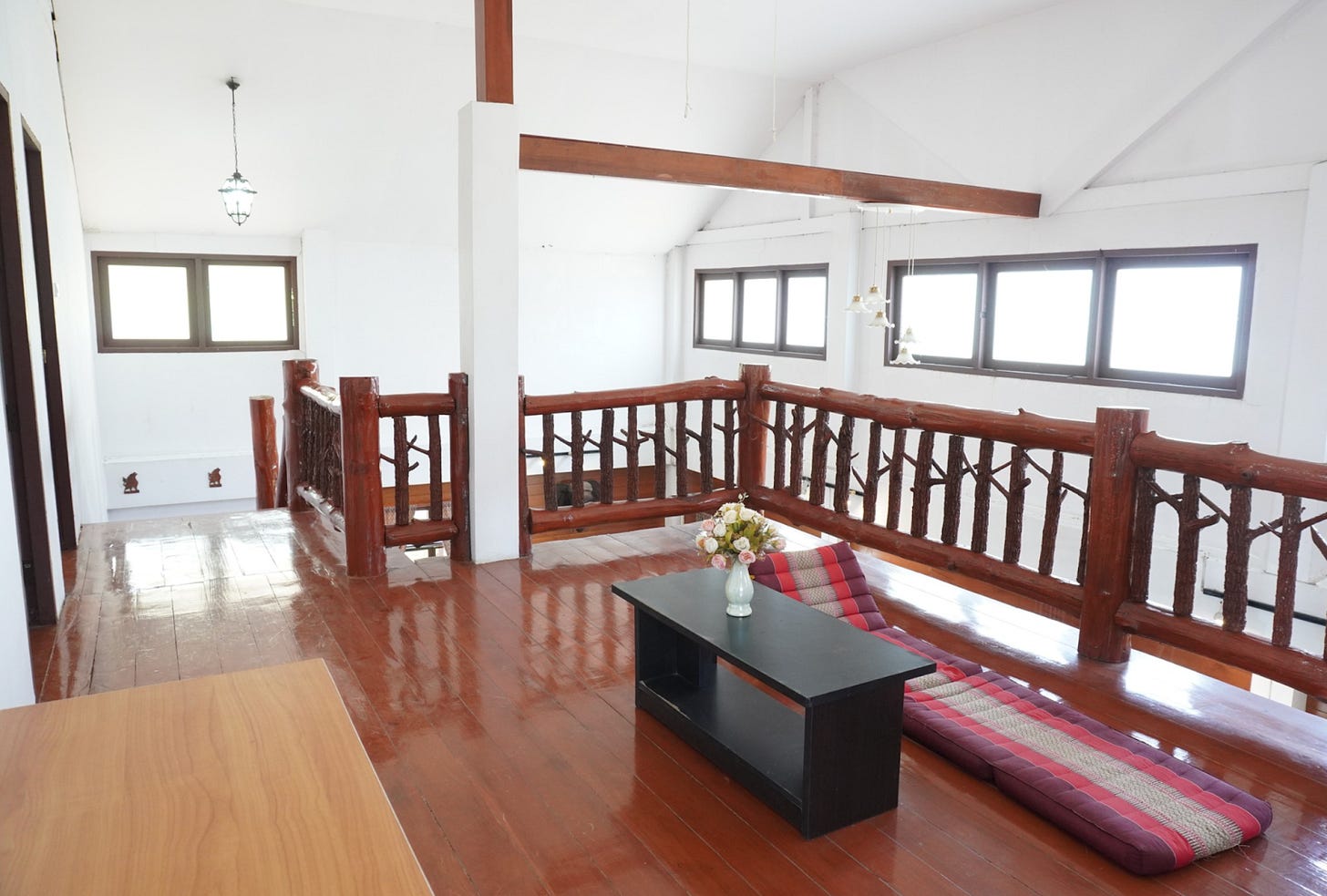 Upstairs landing leading to two large bedrooms, each with an en-suite bathroom.
