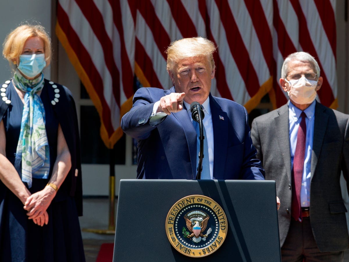 Trump's top health officials seen but not heard as coronavirus focus shifts  | Trump administration | The Guardian