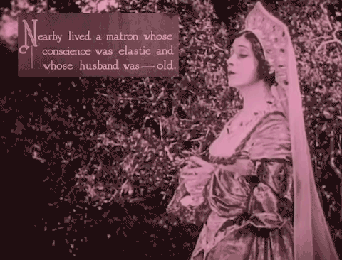 An Elizabethan lady turns her head and flutters her eyelashes. A card reads: "Nearby lived a matron whose conscience was elastic and whose husband was - old"