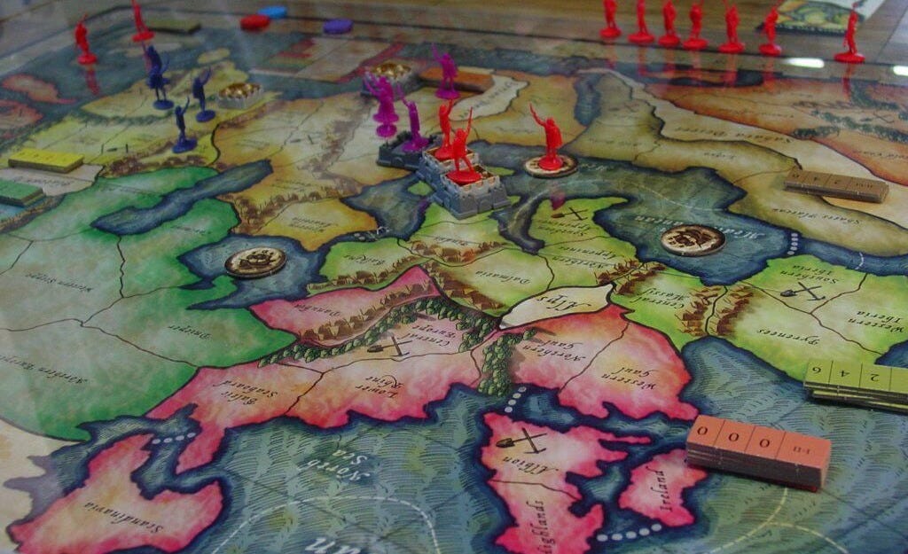 Image of some figures on the History of the World Map, including several pieces on fortification models.