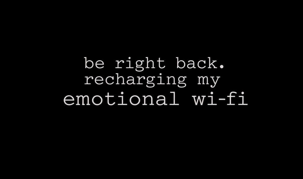 Minimal beige background with the words “Be right back. Recharging my emotional Wi-Fi.”