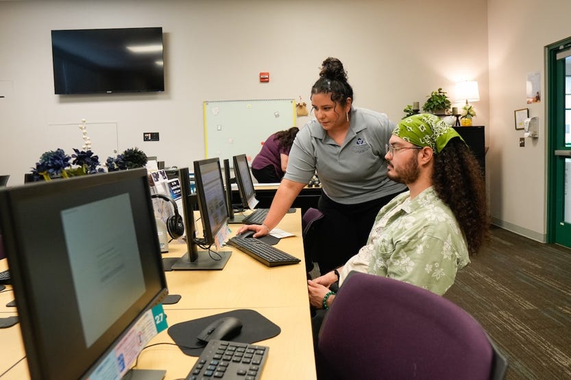 A group of people working on computersAI-generated content may be incorrect. A group of people working on computersAI-generated content may be incorrect.