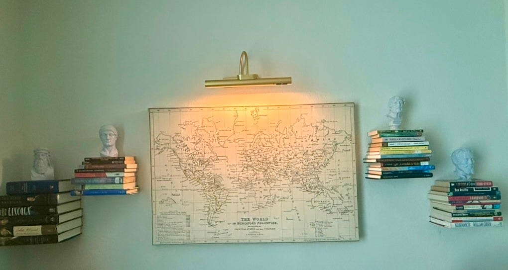 Floating library with a map and busts