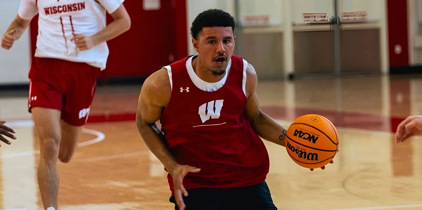 Former Wisconsin Badgers guard Johnny Davis seen practicing with the current team during a workout at the Nicholas-Johnson Pavilion. Former Wisconsin Badgers guard Johnny Davis seen practicing with the current team during a workout at the Nicholas-Johnson Pavilion.