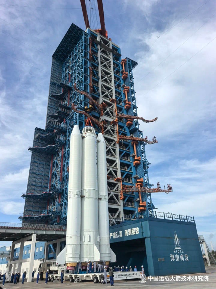 The Long March 8's first and second stages being transported to Commercial Launch Pad 1, and being lifted onto it. | Image: China Academy of Launch Vehicle Technology / China Aerospace Science and Technology Corporation