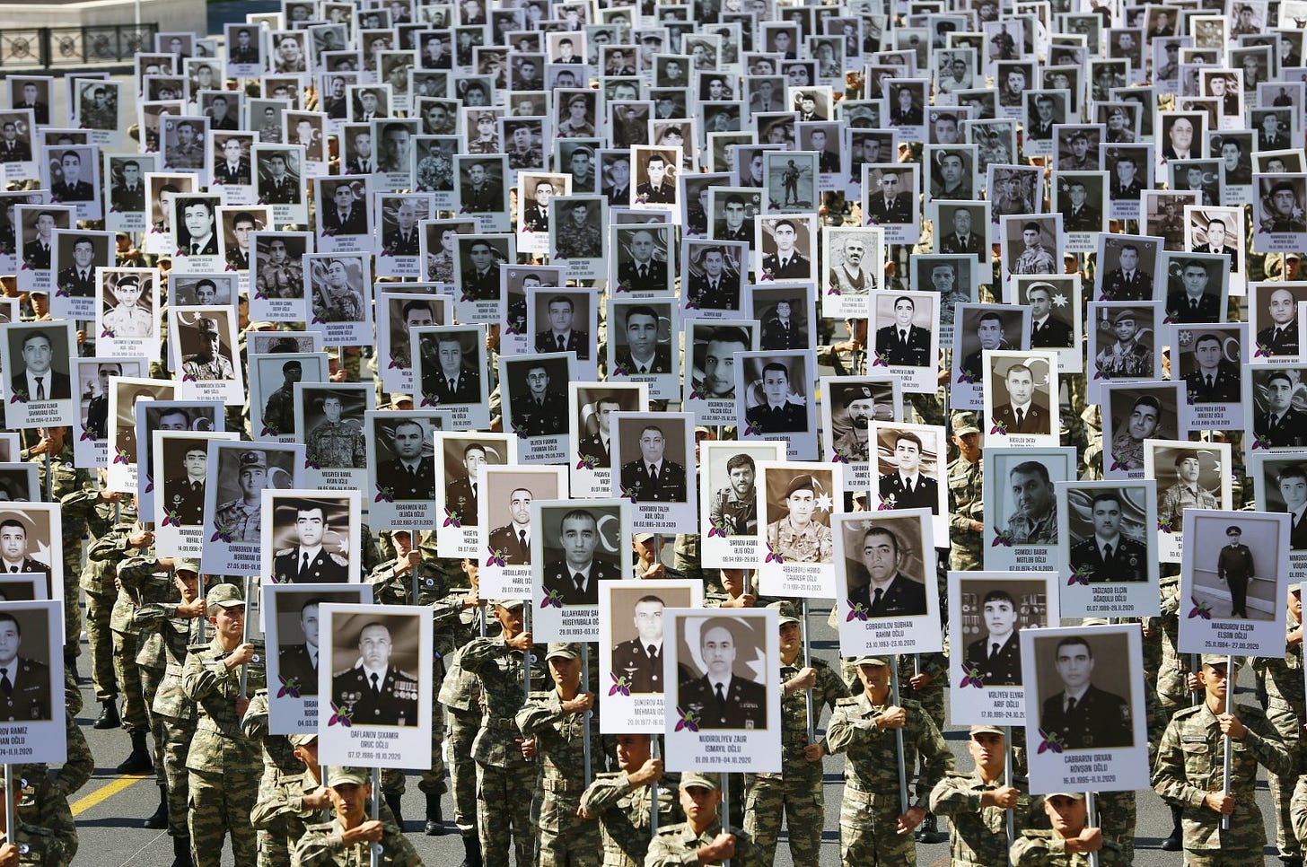 On the first year anniversary of the 44-day war started on Sept. 27, 2020 for the liberation of the lands occupied by Armenia, a march was held in Azerbaijan in memory of the fallen soldiers in Baku, Azerbaijan, Sept. 27, 2021. (AA Photo)