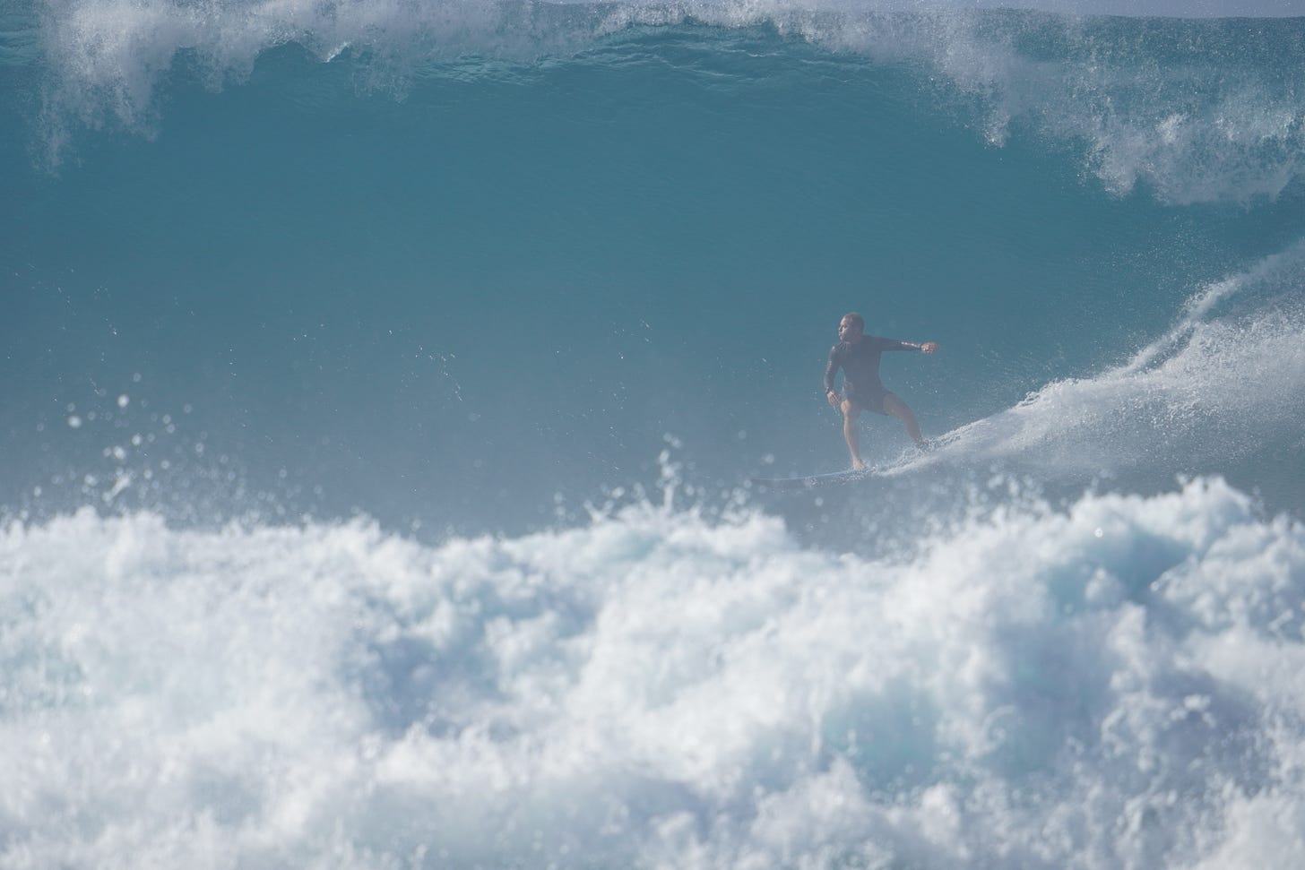 Picture of Nat Sharratt charging the waves in Puerto Rico