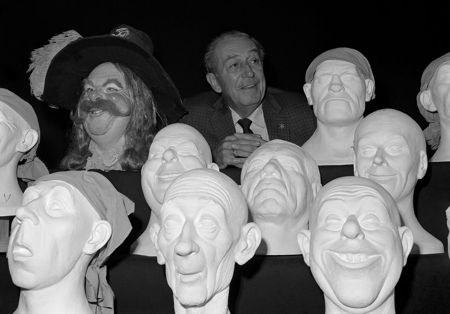 Walt Disney with Pirates of the Caribbean busts Walt Disney with Pirates of the Caribbean busts