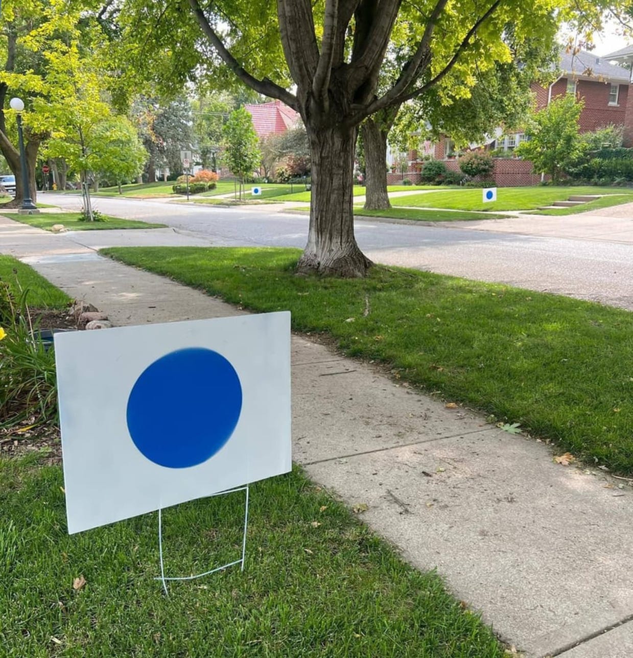 This blue dot is popping up across Nebraska and it’s now a political symbol