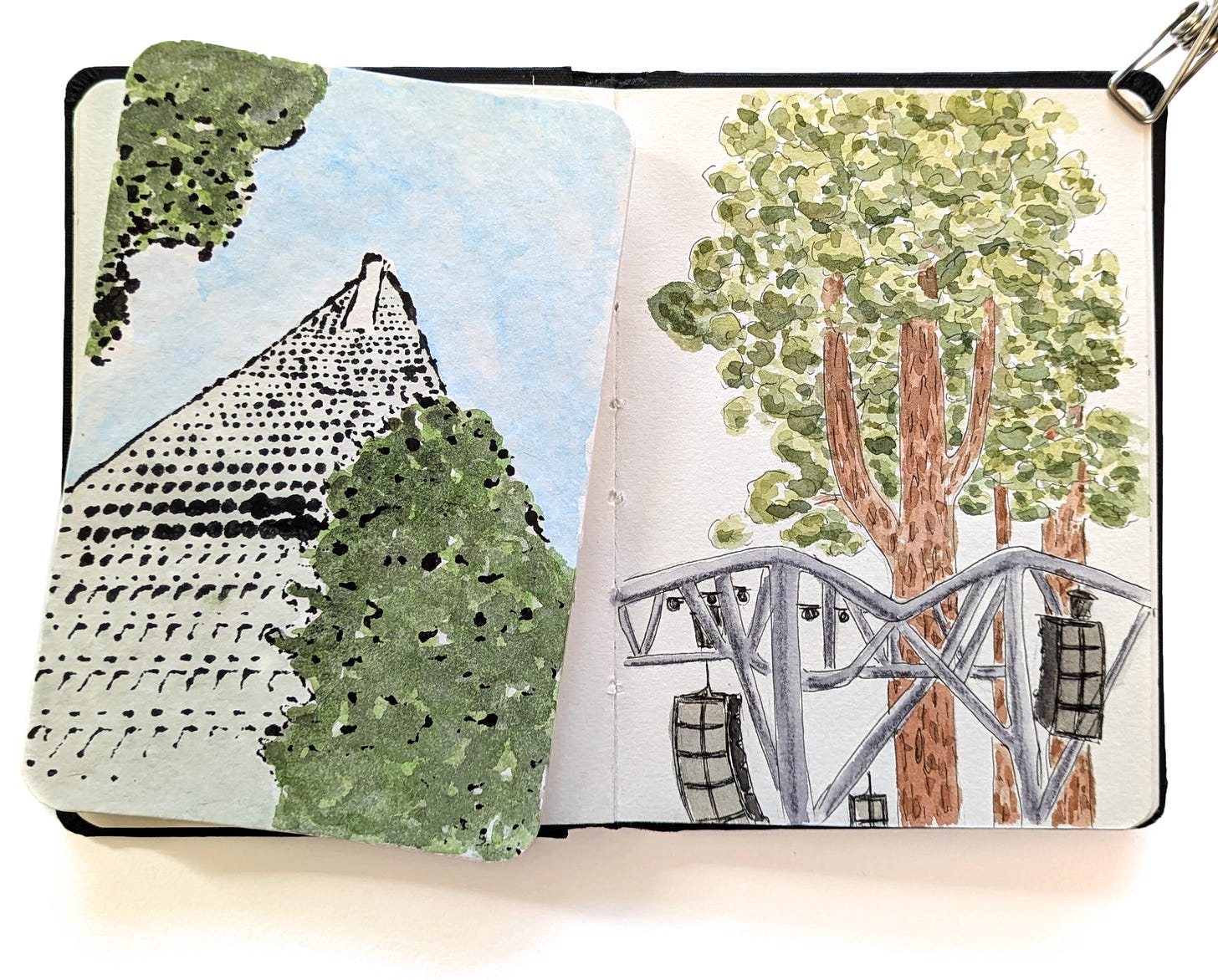 Monoprint and watercolor postcard depicting up-view of the Transamerica building. Watercolor sketchbook with drawing and watercolor of trees and speakers on the Stern Grove stage.