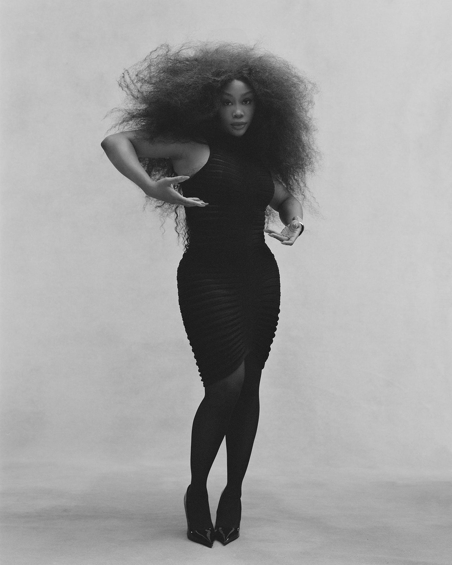 Image may contain SZA Face Head Person Photography Portrait Adult Clothing Footwear High Heel Shoe and Fashion