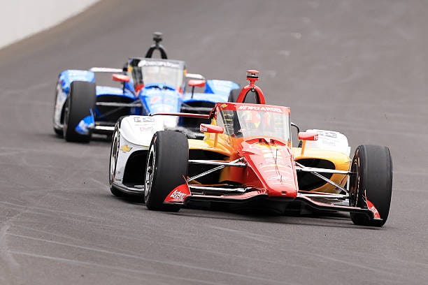 Josef Newgarden, driver of Astemo Team Penske Chevrolet, drives during practice of The 110th Running of the Indianapolis 500 Carb Day at Indianapolis... Josef Newgarden, driver of Astemo Team Penske Chevrolet, drives during practice of The 110th Running of the Indianapolis 500 Carb Day at Indianapolis...