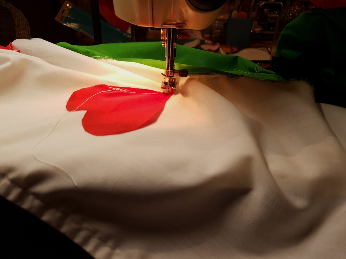 New Palestinian flag in the process of being sewn.